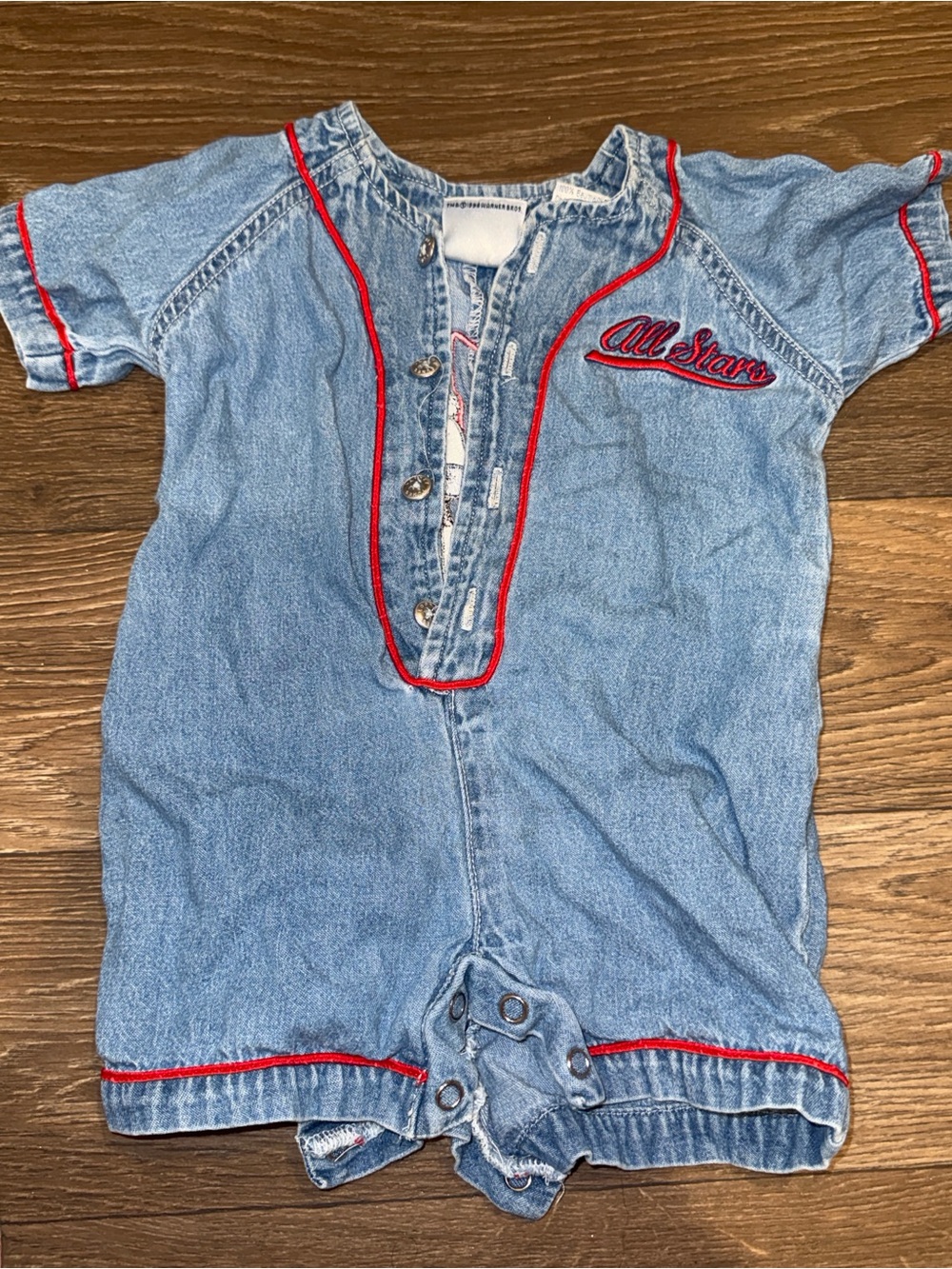 Warner Bros. Light Blue Denim Romper with Red Piping. Bugs bunny and taz